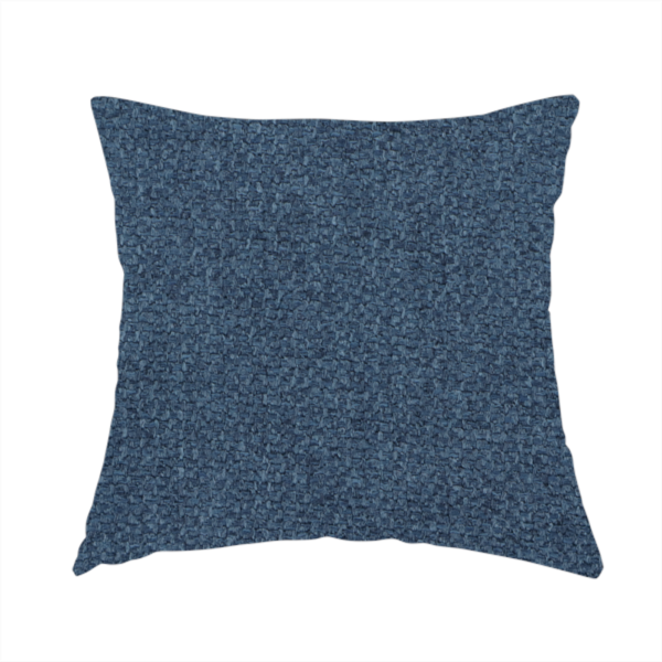 The fabric used to create this handmade cushion is a Chamonix Water Repellent upholstery fabric in Navy Blue. The material features a dense, multi-tonal indigo basket weave texture with a durable, matte finish.