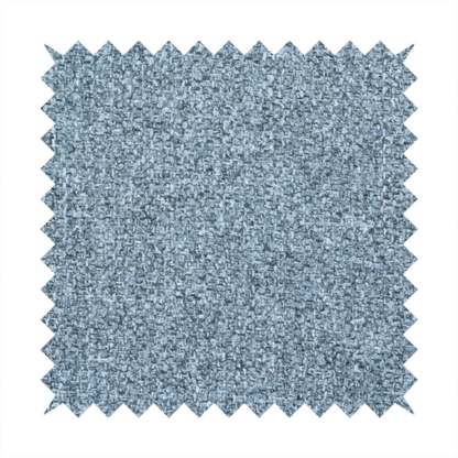 A Chamonix Water Repellent upholstery fabric in Denim Blue. The material features a dense, multi-tonal basket weave texture with blue and grey threads and a durable, matte finish.