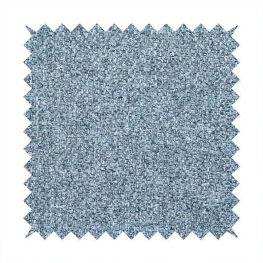 A Chamonix Water Repellent upholstery fabric in Denim Blue. The material features a dense, multi-tonal basket weave texture with blue and grey threads and a durable, matte finish.