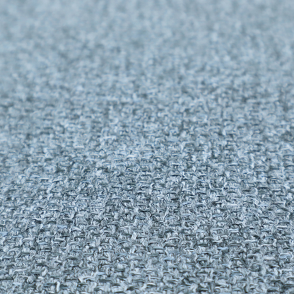 A Chamonix Water Repellent upholstery fabric in Denim Blue. The material features a dense, multi-tonal basket weave texture with blue and grey threads and a durable, matte finish.