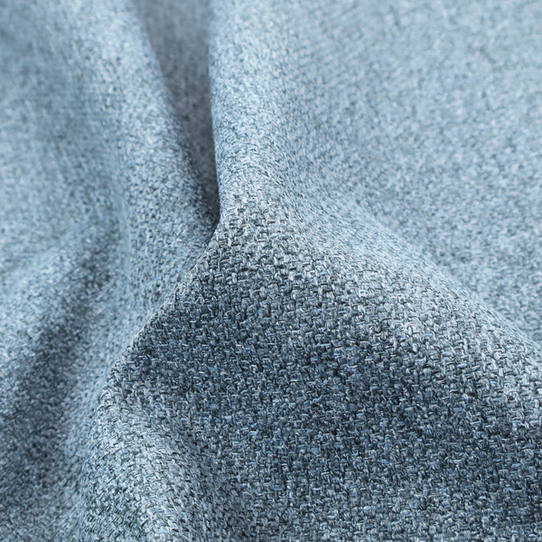 A Chamonix Water Repellent upholstery fabric in Denim Blue. The material features a dense, multi-tonal basket weave texture with blue and grey threads and a durable, matte finish.