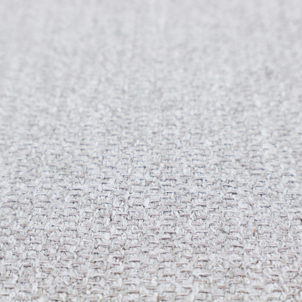 A Chamonix Water Repellent upholstery fabric in Silver. A clean, light-grey basket weave texture with a subtle effect and a sophisticated matte finish.