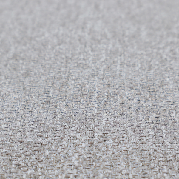This weathered fabric blends charcoal and slate yarns with cool silver and off-white threads, resulting in a balanced, stony neutral that offers a modern and professional aesthetic.