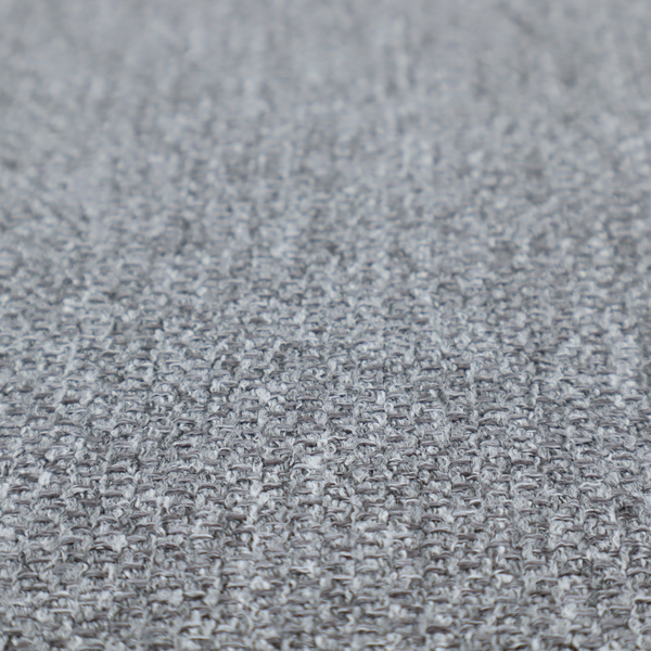 A versatile Mid Grey. This fabric features a classic "salt and pepper" effect, blending charcoal and light silver threads for a balanced, stony appearance that hides wear exceptionally well.