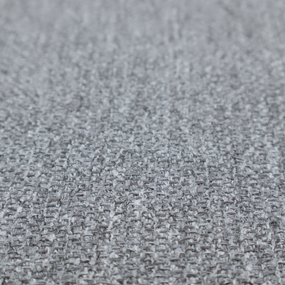 A versatile Mid Grey. This fabric features a classic "salt and pepper" effect, blending charcoal and light silver threads for a balanced, stony appearance that hides wear exceptionally well.