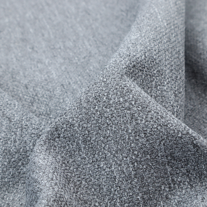 A versatile Mid Grey. This fabric features a classic "salt and pepper" effect, blending charcoal and light silver threads for a balanced, stony appearance that hides wear exceptionally well.