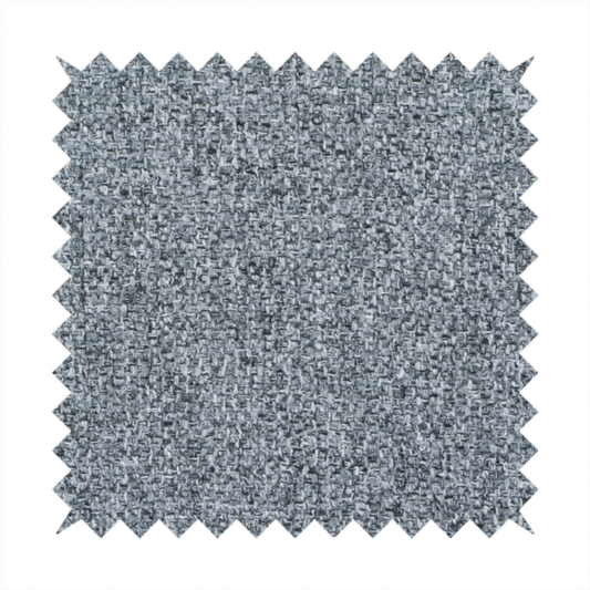 A cool, industrial Steel Grey. This fabric features a high-contrast effect, interlacing charcoal, silver, and bright white threads to create a crisp, textured look that mimics the appearance of salt-and-pepper granite.