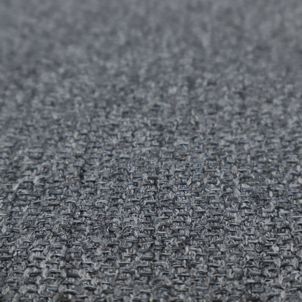 A deep, dramatic Charcoal Grey. This fabric features a high-density basket weave that blends dark soot tones with flecks of slate and silver. The tight, pebbled texture gives the dark colour a sophisticated, matte architectural feel.