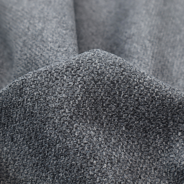 A deep, dramatic Charcoal Grey. This fabric features a high-density basket weave that blends dark soot tones with flecks of slate and silver. The tight, pebbled texture gives the dark colour a sophisticated, matte architectural feel.