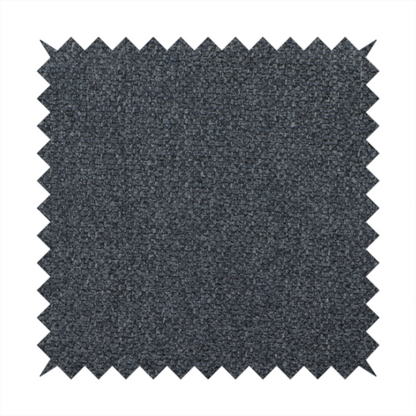 A deep, obsidian Black. Unlike a flat solid, this fabric uses a dense basket weave to create a rich, textured surface. The interlacing yarns catch the light in a way that provides a soft charcoal sheen, adding depth to the dark palette.