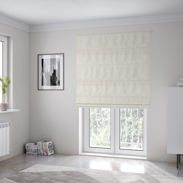 The fabric used to create these Roman blinds is a light beige woven fabric with a subtle, textured grid pattern.