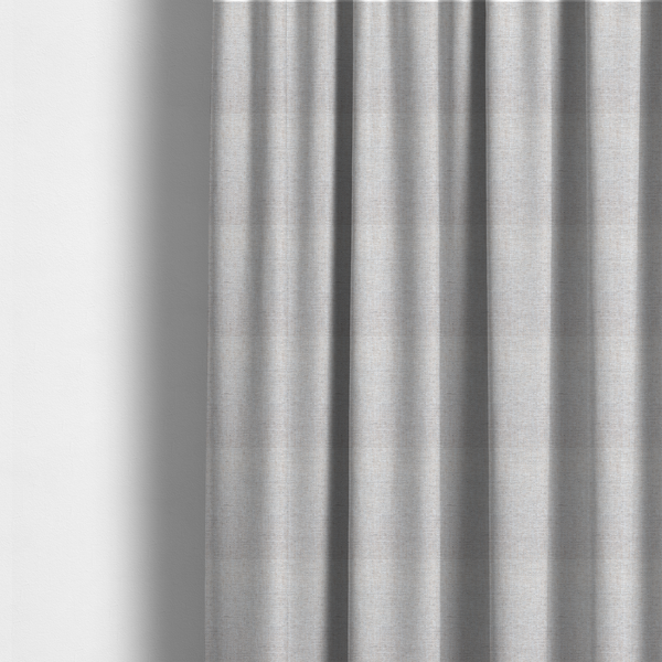 The fabric used to create these made-to-measure curtains is a marl grey woven fabric with a heathered, multi-tonal textured finish.