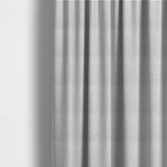 The fabric used to create these made-to-measure curtains is a marl grey woven fabric with a heathered, multi-tonal textured finish.