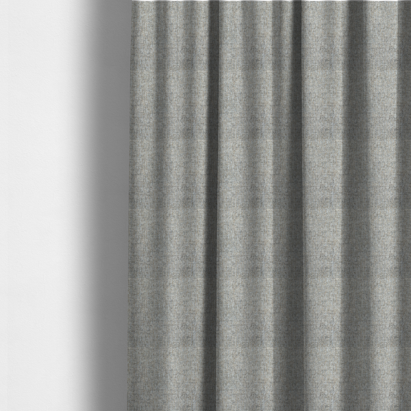 The fabric used to create these made-to-measure curtains is a ash brown woven fabric with a multi-tonal, heathered texture.