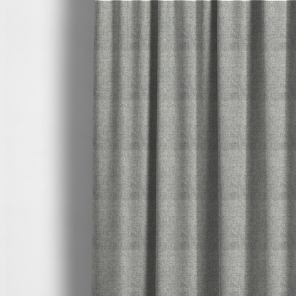 The fabric used to create these made-to-measure curtains is a ash brown woven fabric with a multi-tonal, heathered texture.