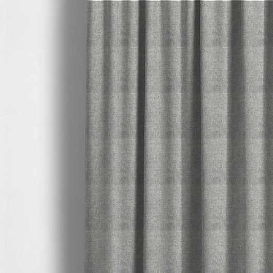 The fabric used to create these made-to-measure curtains is a ash brown woven fabric with a multi-tonal, heathered texture.