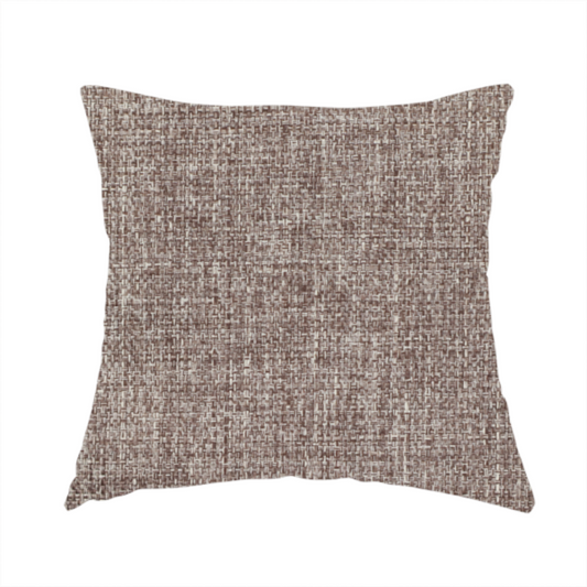 The fabric used to create these handmade cushions is a cocoa brown woven fabric with a heathered, multi-tonal texture.