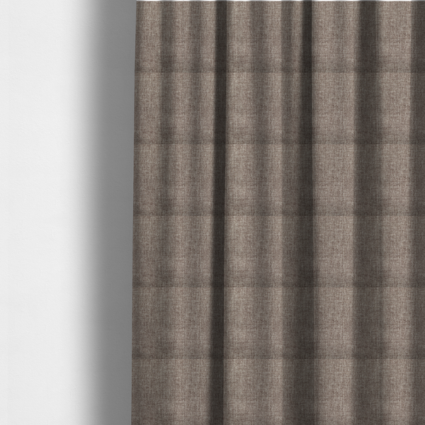 The fabric used to create these made-to-measure curtains is a cocoa brown woven fabric with a heathered, multi-tonal texture.