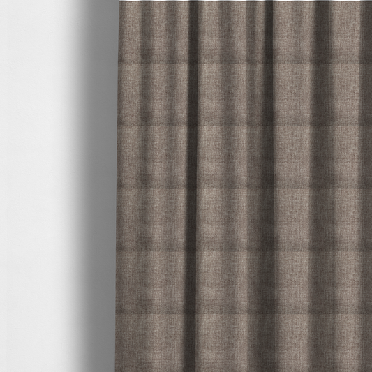 The fabric used to create these made-to-measure curtains is a cocoa brown woven fabric with a heathered, multi-tonal texture.