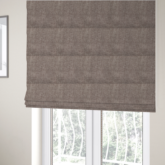The fabric used to create these Roman blinds is a cocoa brown woven fabric with a heathered, multi-tonal texture.
