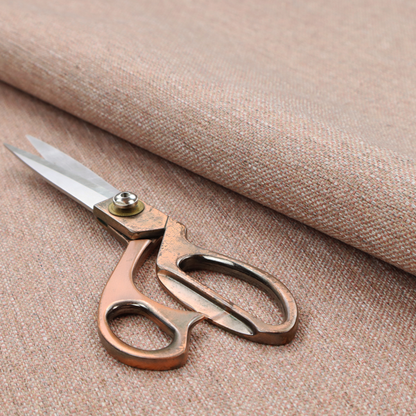 A terracotta orange woven fabric with a multi-tonal, heathered texture.