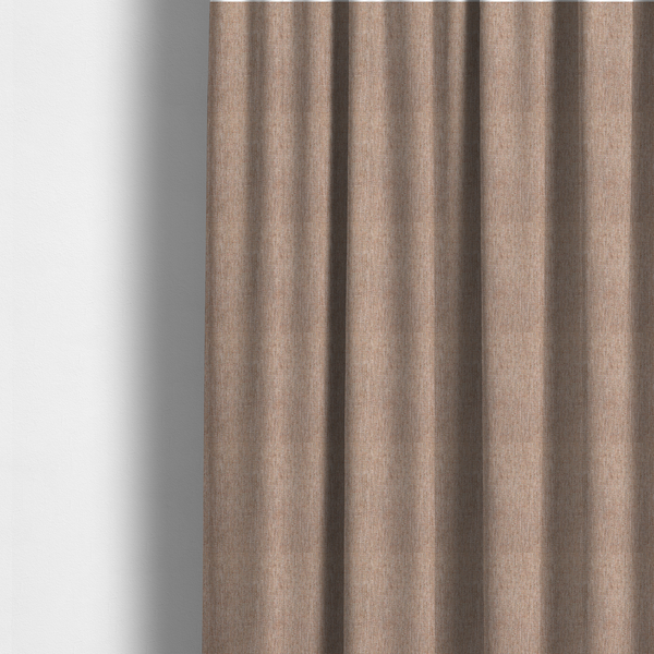 The fabric used to create these made-to-measure curtains is a terracotta orange woven fabric with a multi-tonal, heathered texture.