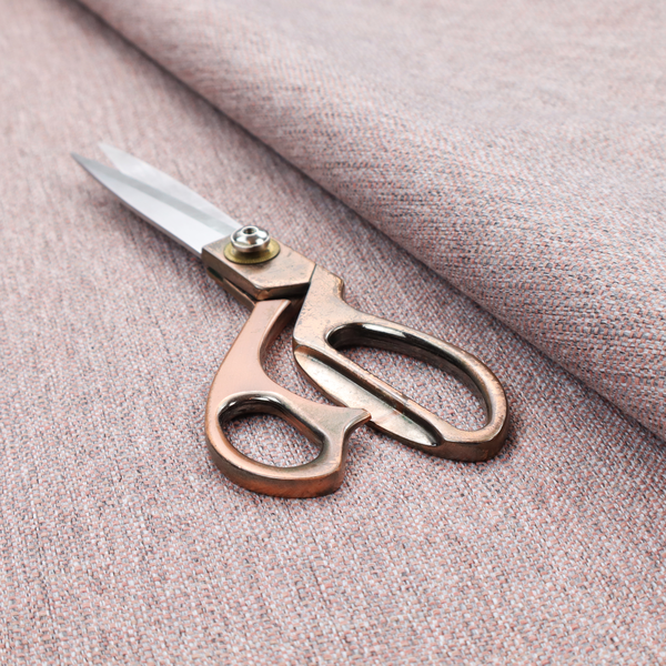A dusty rose woven fabric with a multi-tonal, heathered texture.