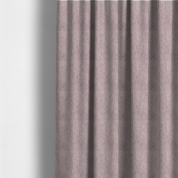 The fabric used to create these made-to-measure curtains is a dusty rose woven fabric with a multi-tonal, heathered texture.