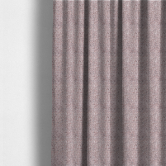The fabric used to create these made-to-measure curtains is a dusty rose woven fabric with a multi-tonal, heathered texture.