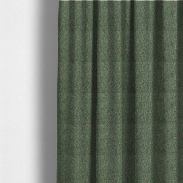 The fabric used to create these made-to-measure curtains is a olive green woven fabric with a multi-tonal, heathered texture.