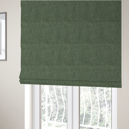 The fabric used to create these Roman blinds is a olive green woven fabric with a multi-tonal, heathered texture.