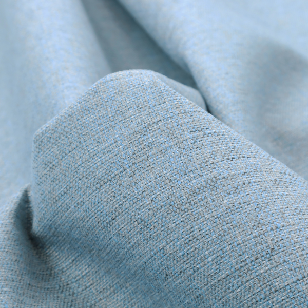 A sky blue woven fabric with a multi-tonal, heathered texture.