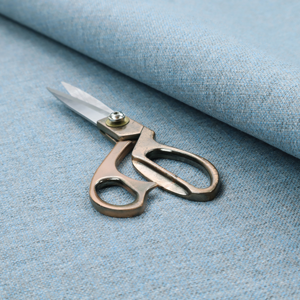 A sky blue woven fabric with a multi-tonal, heathered texture.
