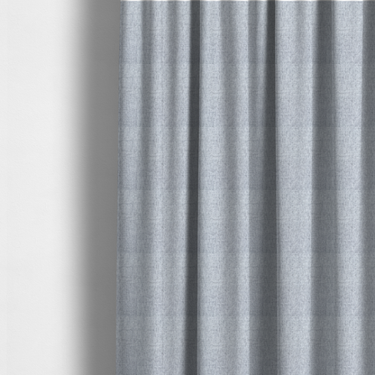 Fabric used to create these made-to-measure curtains is a silver grey woven fabric with a clean, heathered texture.