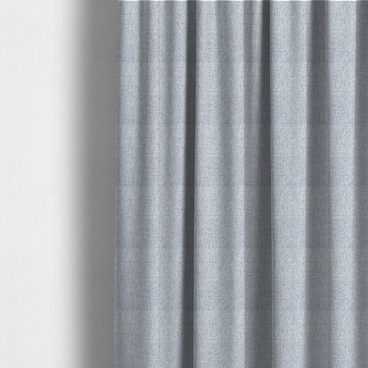 Fabric used to create these made-to-measure curtains is a silver grey woven fabric with a clean, heathered texture.