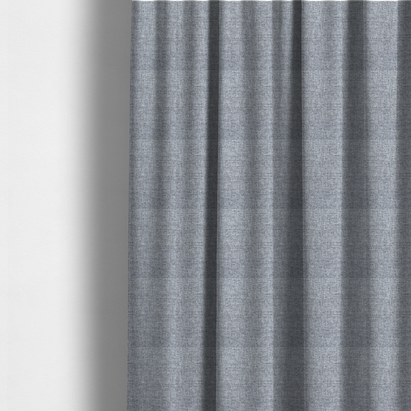 The fabric used to create these made-to-measure curtains is a slate grey woven fabric with a dense, multi-tonal heathered texture.
