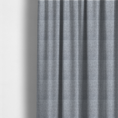 The fabric used to create these made-to-measure curtains is a slate grey woven fabric with a dense, multi-tonal heathered texture.