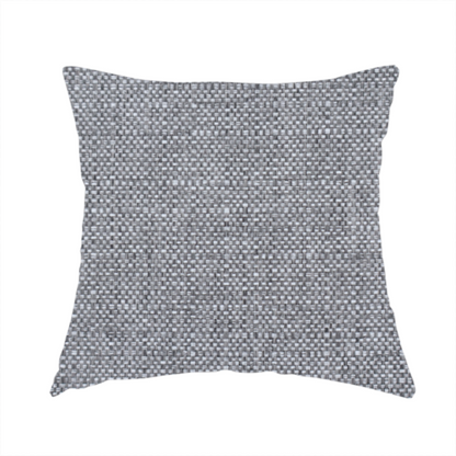 The fabric used to create this handmade cushion is a steel grey woven fabric with a dense, multi-tonal heathered texture.