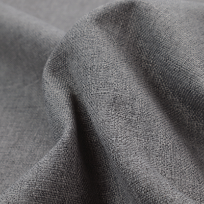 a graphite grey woven fabric with a dense, multi-tonal heathered texture.
