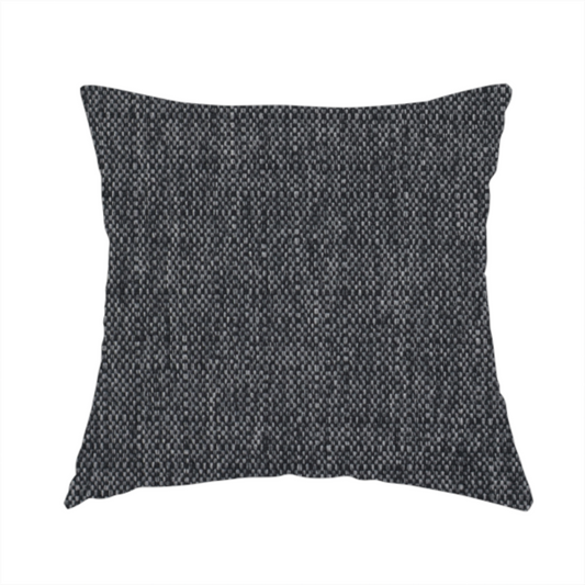 The fabric used to create these handmade cushions is a black and grey woven fabric with a tight, salt-and-pepper heathered texture.