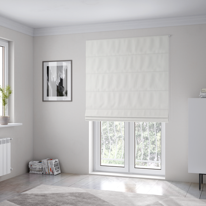 The fabric used to create these Roman blinds is a solid white, water-repellent velvet fabric. The surface features a dense, low-profile pile that creates a soft, matte appearance with a subtle, plush texture. The uniform white colour and specialized finish give it a clean, luxurious, and high-performance look.