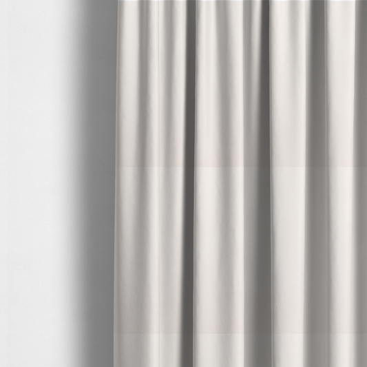 The fabric used to create these curtains features a dense, soft pile with a subtle matte sheen. The warm, off-white cream tone is uniform throughout, offering a luxurious and durable finish suitable for high-end upholstery.