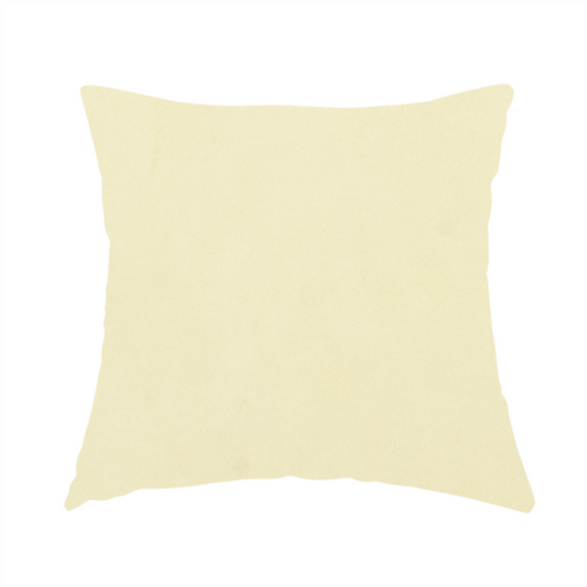 The fabric used to create this handmade cushion displays a dense, plush pile with a soft matte finish in a warm, buttery off-white shade. Its uniform texture and specialized water-resistant coating make it a luxurious yet practical choice for upholstery.