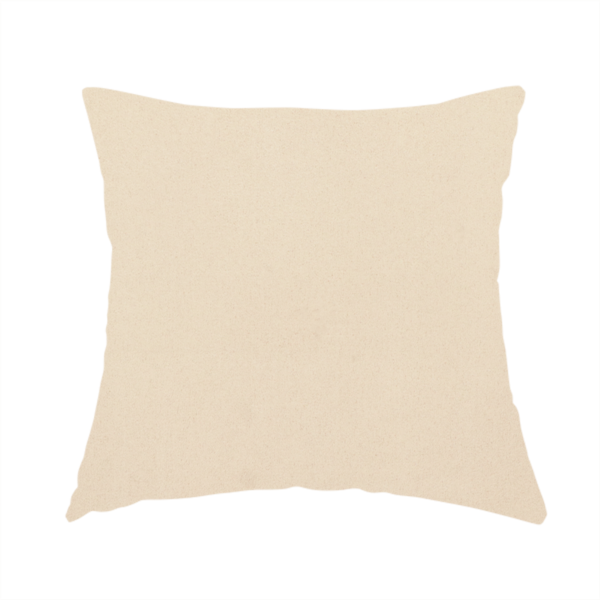 The fabric used to create this handmade cushion features a fine, dense pile with a soft matte finish in a pale, sandy-beige tone. This high-performance upholstery material offers a luxurious feel with built-in moisture resistance for added durability.