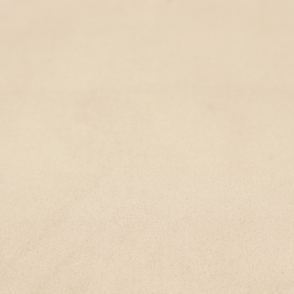 Annecy Water Repellent Velvet in Champagne. The fabric features a fine, dense pile with a soft matte finish in a pale, sandy-beige tone. This high-performance upholstery material offers a luxurious feel with built-in moisture resistance for added durability.