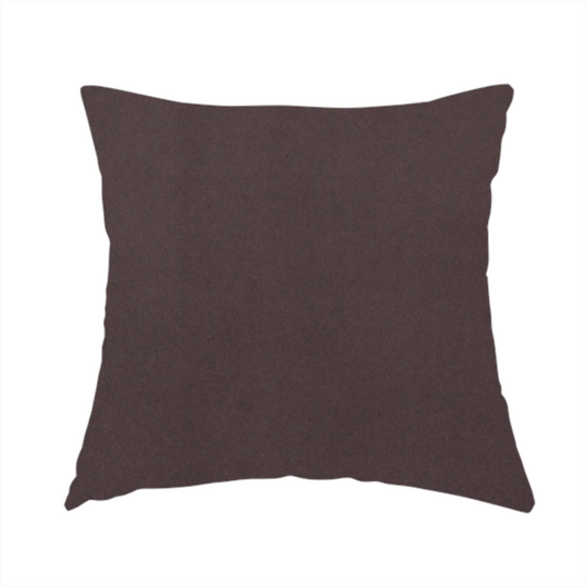The fabric used to create this handmade cushion displays a dense, low-profile pile with a soft matte finish in a deep, sophisticated chocolate brown. This high-performance upholstery material offers a plush texture and a specialized water-resistant coating for superior durability.