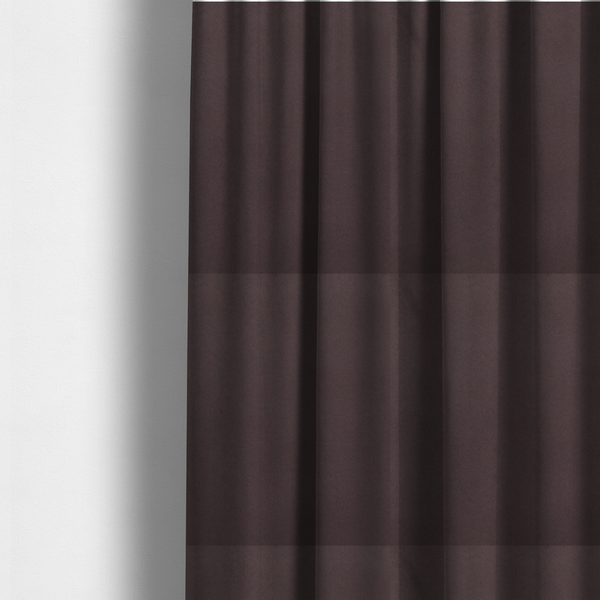 The fabric used to create these made-to-measure curtains displays a dense, low-profile pile with a soft matte finish in a deep, sophisticated chocolate brown. This high-performance upholstery material offers a plush texture and a specialized water-resistant coating for superior durability.
