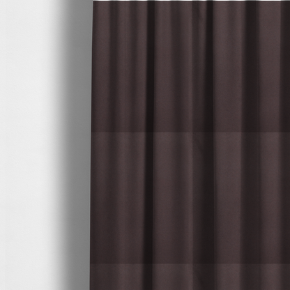 The fabric used to create these made-to-measure curtains displays a dense, low-profile pile with a soft matte finish in a deep, sophisticated chocolate brown. This high-performance upholstery material offers a plush texture and a specialized water-resistant coating for superior durability.