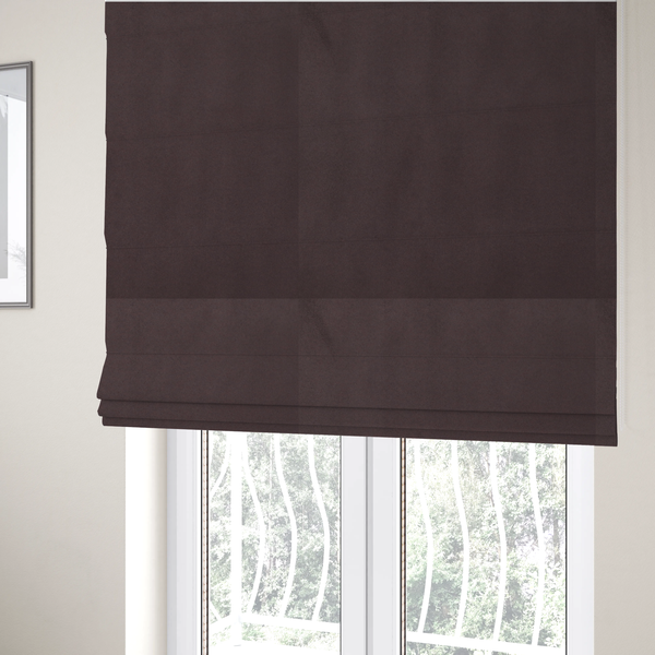 The fabric used to create these Roman blinds displays a dense, low-profile pile with a soft matte finish in a deep, sophisticated chocolate brown. This high-performance upholstery material offers a plush texture and a specialized water-resistant coating for superior durability.