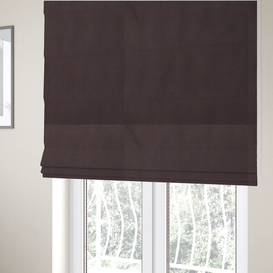 The fabric used to create these Roman blinds displays a dense, low-profile pile with a soft matte finish in a deep, sophisticated chocolate brown. This high-performance upholstery material offers a plush texture and a specialized water-resistant coating for superior durability.